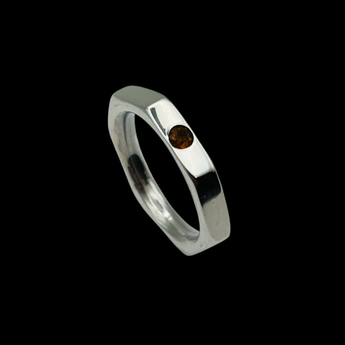 The Heptagon with flush set gem stone